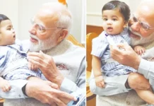 சின்னஞ்சிறு நண்பனுடன் பிரதமர் மோடி