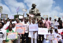 அமைச்சர் ராஜினாமா விவகாரம் – காங்கிரஸ் பிஜேபி போட்டி போராட்டம்